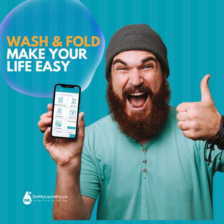 a man holding a phone and giving a thumbs up